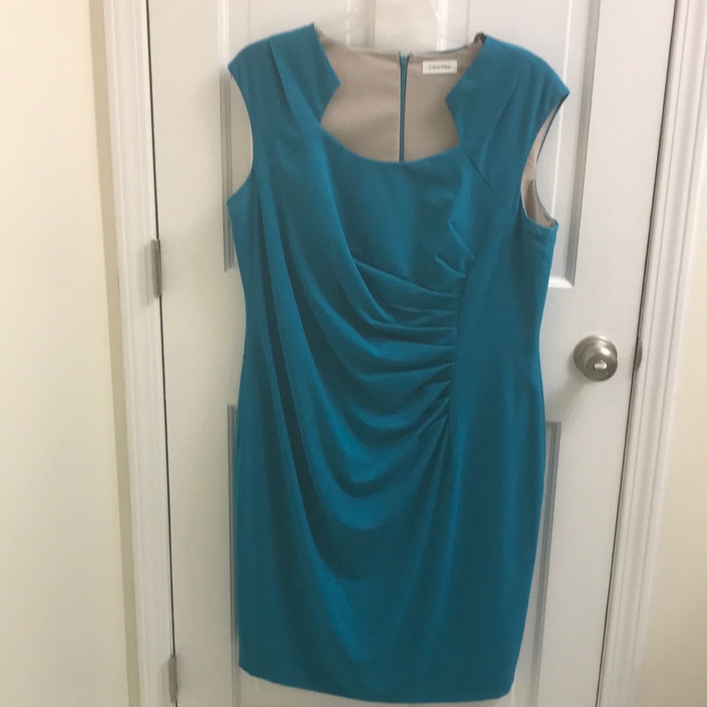 Beautiful teal dress.  Knee length. Cap sleeves